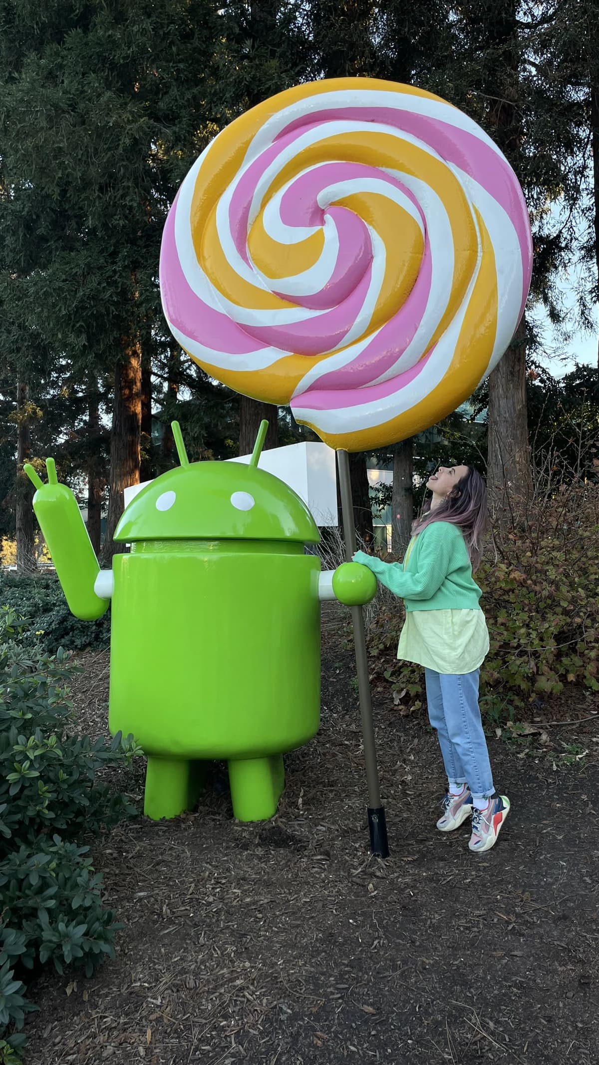 Nata next to the Android lollipop statue at the Google campus